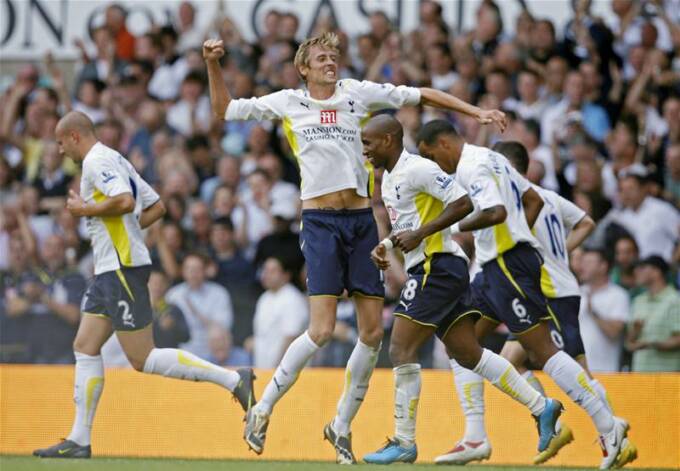 Peter Crouch celebrates his goal against Birmingham City