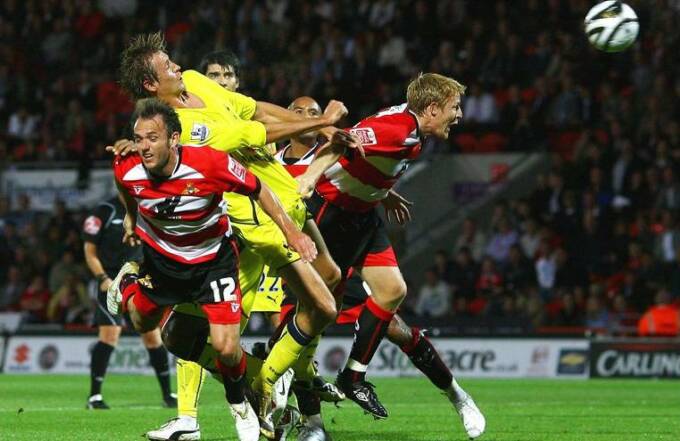 Peter Crouch scores for Spurs against Doncaster Rovers