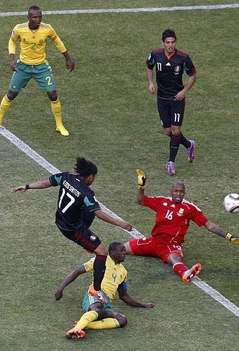 Dos Santos in action in Mexico's opening game of the 2010 World Cup Finals against South Africa