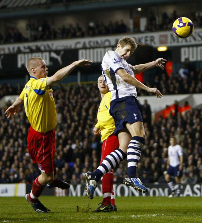 Michael Dawson scores Tottenham's third goal against Stoke City